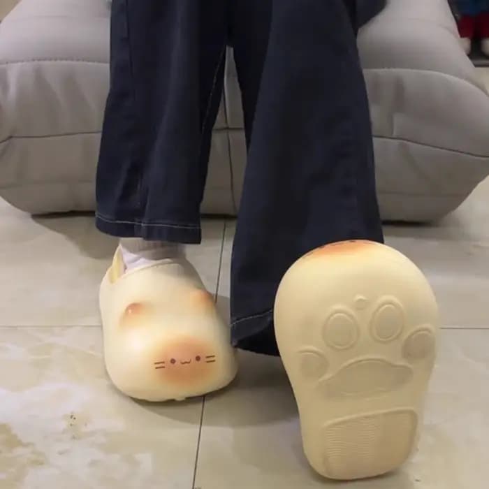 Nouvelles pantoufles mignonnes à motif de patte de chat