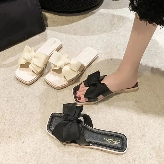 Pantoufles élégantes à semelle souple avec nœud papillon