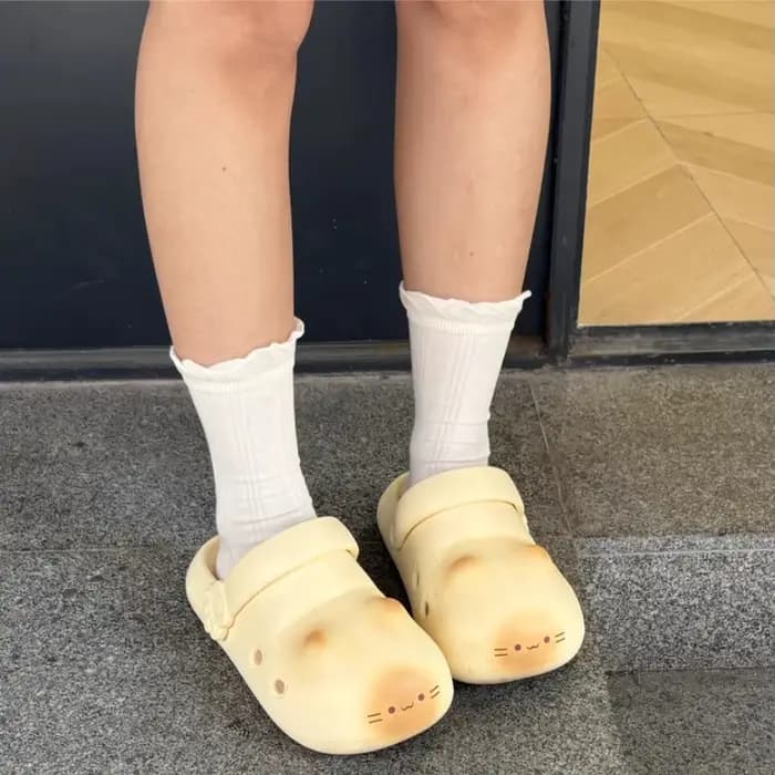Nouvelles pantoufles mignonnes à motif de patte de chat