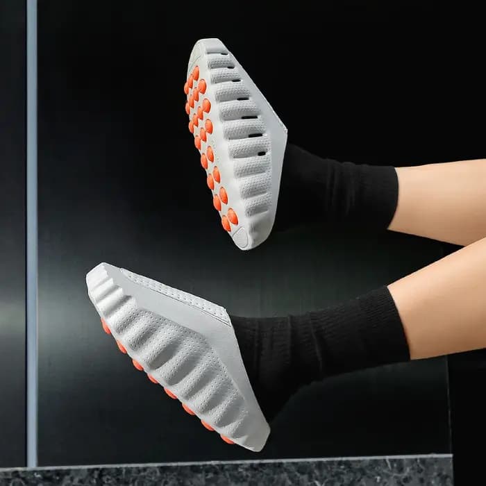 Chaussons de mode pour hommes et femmes avec massage par détection plantaire