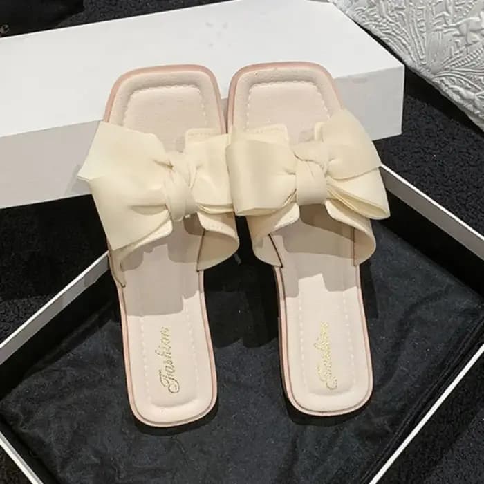 Pantoufles élégantes à semelle souple avec nœud papillon