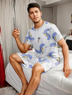Ensemble pyjama pour homme avec imprimés dinosaures en carton, comprenant un haut à manches courtes