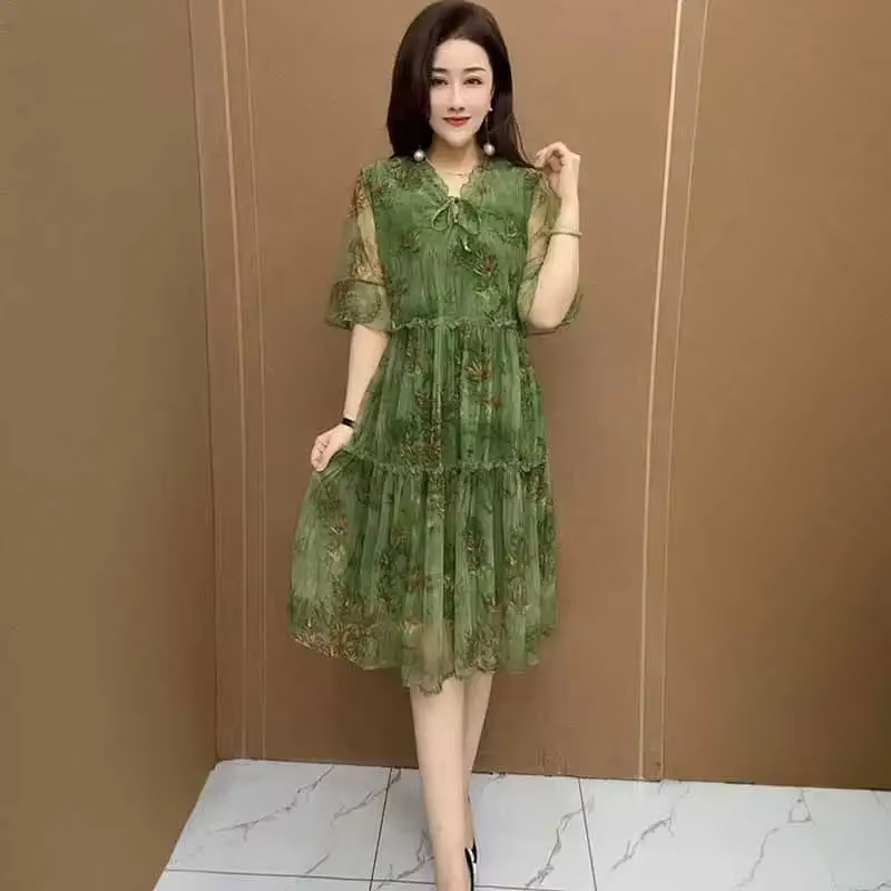 Robe d'été bohème à imprimé floral vert avec manches bouffantes, col à nœud, coupe évasée, longueur 