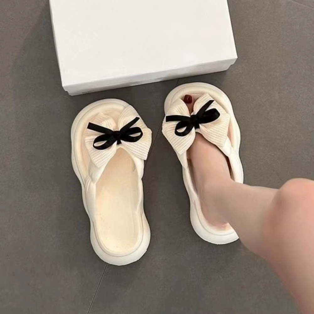 Pantoufles antidérapantes à nœud papillon